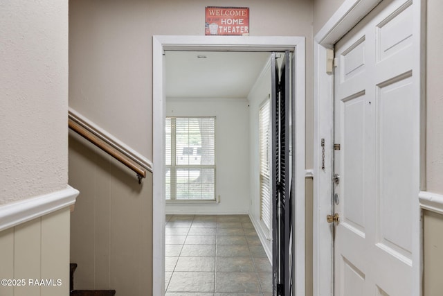 301 Broadmoor Blvd, Lafayette, LA 70503 - tiled foyer with a wainscoted wall