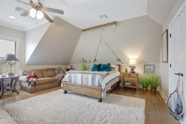 121 Snapping Ln, Broussard, LA 70518 - bedroom featuring vaulted ceiling, wood finished floors, and a ceiling fan