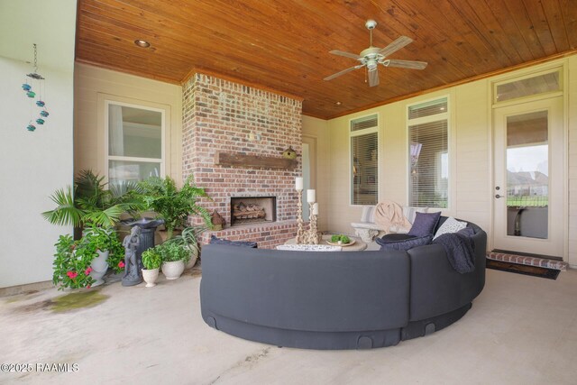 121 Snapping Ln, Broussard, LA 70518 - view of patio with an outdoor living space with a fireplace and a ceiling fan