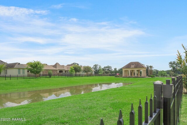 121 Snapping Ln, Broussard, LA 70518 - fenced yard featuring a water view
