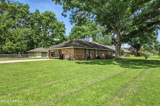 301 Estainville Ave, Lafayette, LA 70508 - ranch-style house with concrete driveway, brick siding, and a carport