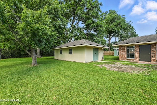 301 Estainville Ave, Lafayette, LA 70508 - view of yard with an outdoor structure