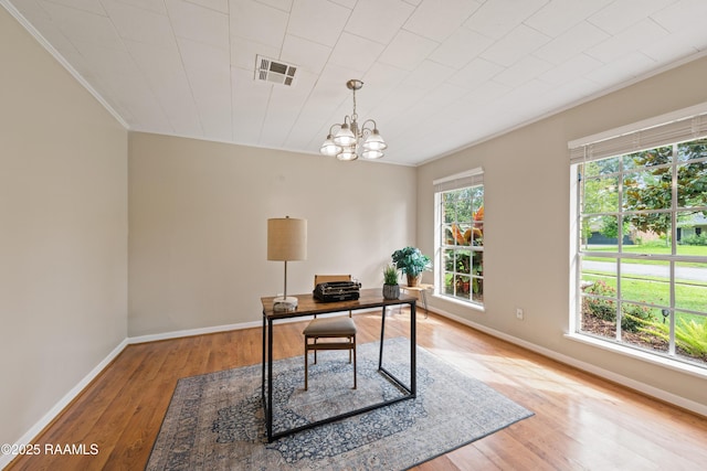 110 Shipley Dr, Lafayette, LA 70508 - office with ornamental molding, wood finished floors, and a chandelier