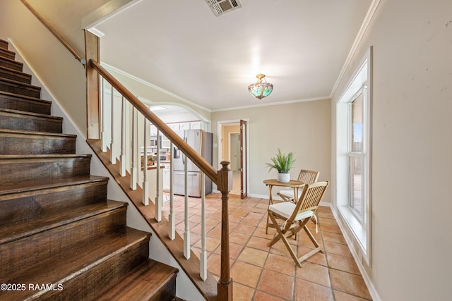 110 Shipley Dr, Lafayette, LA 70508 - stairway with arched walkways and crown molding