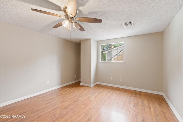 110 Shipley Dr, Lafayette, LA 70508 - unfurnished room with light wood-style flooring, a textured ceiling, and a ceiling fan