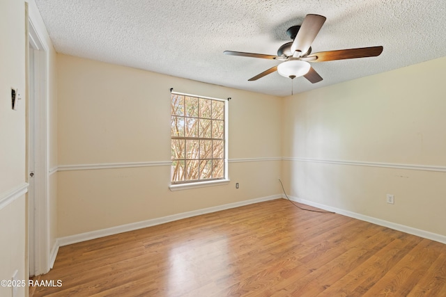 110 Shipley Dr, Lafayette, LA 70508 - empty room featuring wood finished floors, ceiling fan, and a textured ceiling