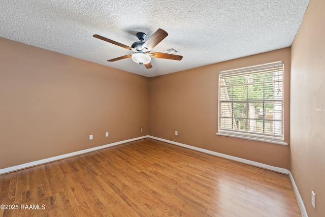 110 Shipley Dr, Lafayette, LA 70508 - spare room with ceiling fan, wood finished floors, and a textured ceiling