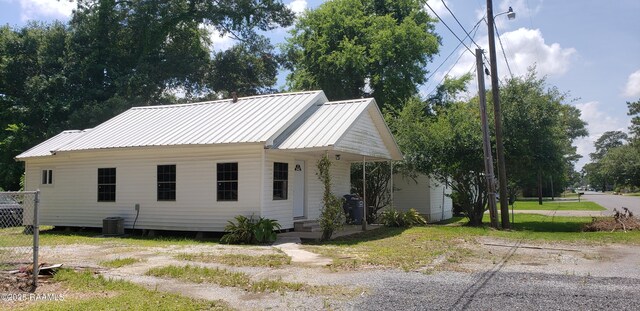 1814 E Lafayette St, Abbeville, LA 70510 - view of front of home with a metal roof