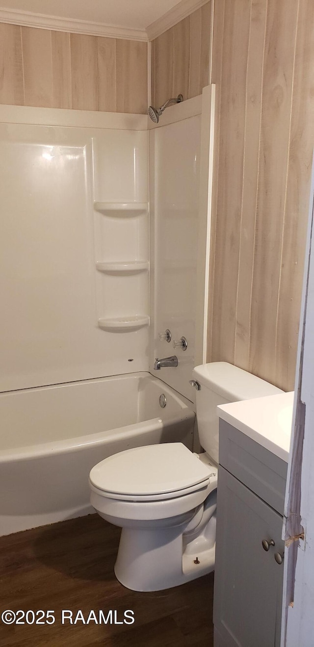 1814 E Lafayette St, Abbeville, LA 70510 - bathroom featuring wood finished floors, vanity, and bathtub / shower combination