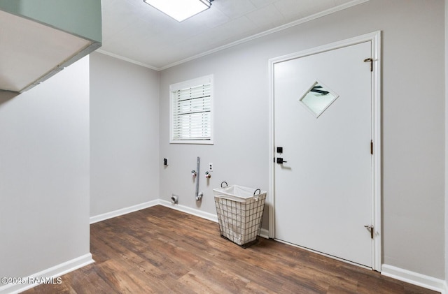 381 Rue Dauphine, Eunice, LA 70535 - laundry area featuring hookup for a washing machine, ornamental molding, wood finished floors, and electric dryer hookup