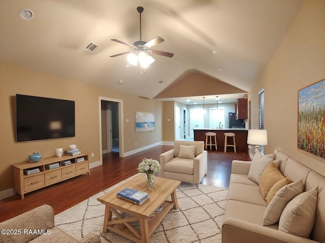 120 Acacia Ln, Abbeville, LA 70510 - living area with a ceiling fan, vaulted ceiling, and wood finished floors