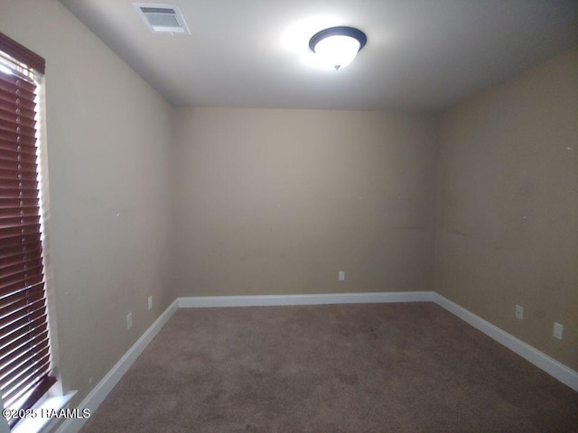 120 Acacia Ln, Abbeville, LA 70510 - carpeted spare room featuring baseboards