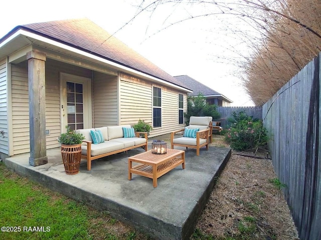 120 Acacia Ln, Abbeville, LA 70510 - fenced backyard with outdoor lounge area and a patio area