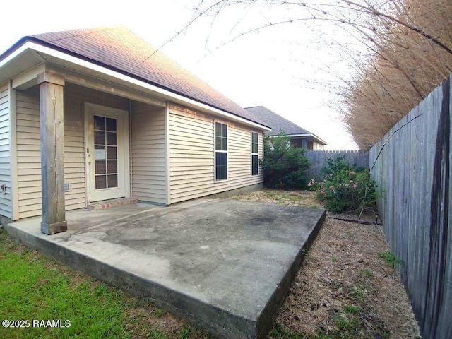120 Acacia Ln, Abbeville, LA 70510 - fenced backyard with a patio area