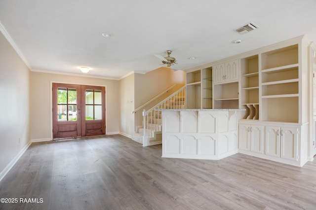 115 Breckenridge Loop, Lafayette, LA 70506 - entryway with crown molding, stairway, light wood finished floors, a ceiling fan, and french doors