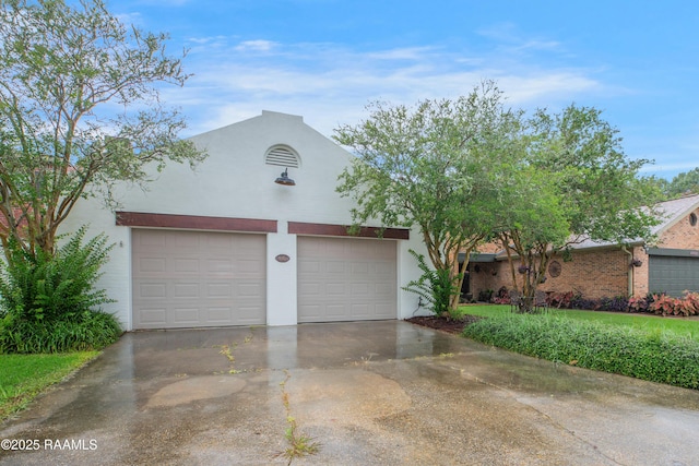 115 Breckenridge Loop, Lafayette, LA 70506 - garage featuring driveway