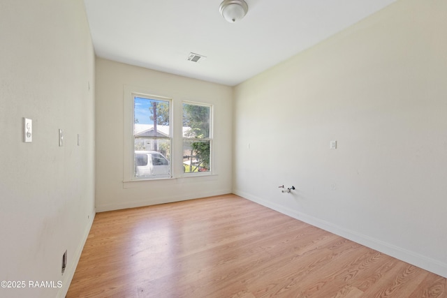 617 E Vermillion St, Lafayette, LA 70501 - empty room featuring light wood-style flooring and baseboards