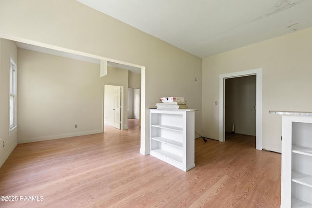 617 E Vermillion St, Lafayette, LA 70501 - spare room featuring light wood-style flooring and baseboards