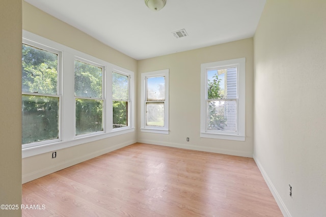 617 E Vermillion St, Lafayette, LA 70501 - spare room featuring light wood-type flooring and baseboards