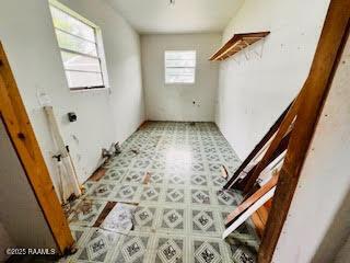 1627 Daniel St, Abbeville, LA 70510 - washroom with tile patterned floors