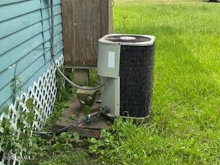 1627 Daniel St, Abbeville, LA 70510 - exterior view of a central air condition unit