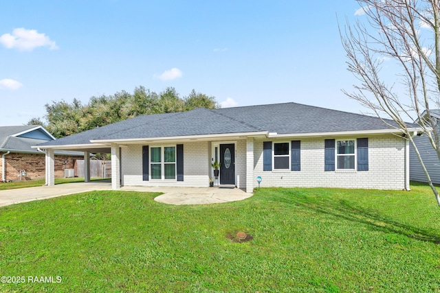 809 Dartez Dr, New Iberia, LA 70563 - ranch-style home with driveway, brick siding, and a front lawn