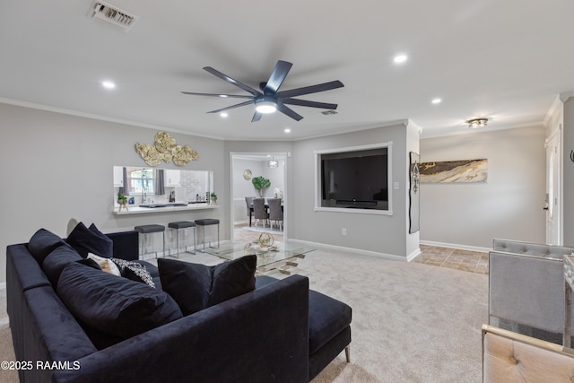 809 Dartez Dr, New Iberia, LA 70563 - living room featuring light colored carpet, ceiling fan, crown molding, and recessed lighting