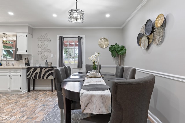 809 Dartez Dr, New Iberia, LA 70563 - dining room with crown molding and recessed lighting