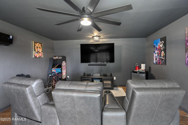 809 Dartez Dr, New Iberia, LA 70563 - cinema room featuring a ceiling fan and wood finished floors