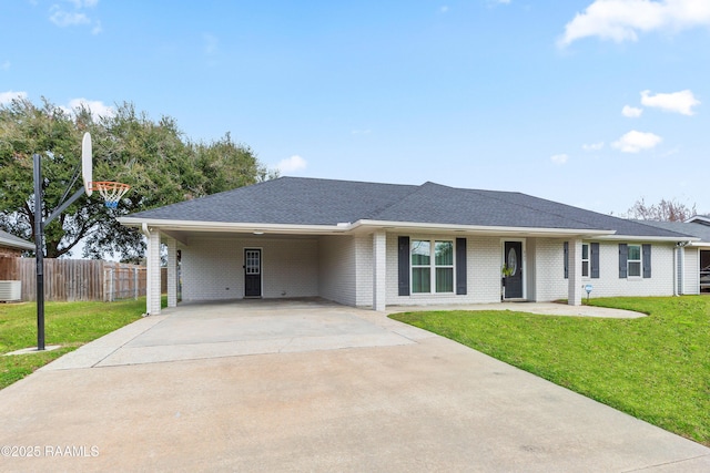 809 Dartez Dr, New Iberia, LA 70563 - single story home featuring concrete driveway, a carport, brick siding, and a shingled roof
