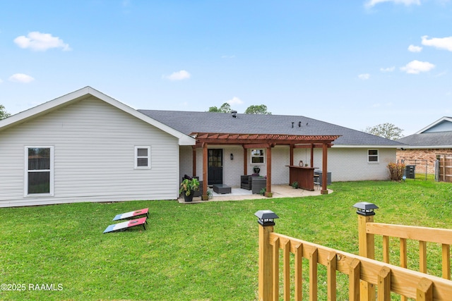 809 Dartez Dr, New Iberia, LA 70563 - rear view of house featuring a pergola, brick siding, a shingled roof, and a patio area