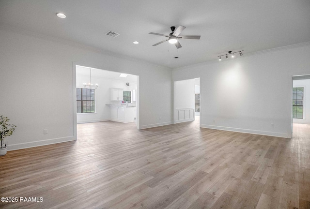 806 Beaujolais Pkwy, Lafayette, LA 70503 - unfurnished living room featuring ornamental molding, ceiling fan, plenty of natural light, light wood-style floors, and recessed lighting