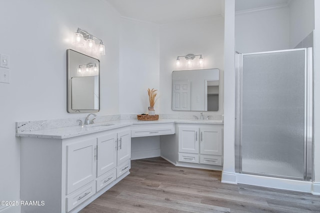 806 Beaujolais Pkwy, Lafayette, LA 70503 - full bathroom with ornamental molding, double vanity, a stall shower, and wood finished floors