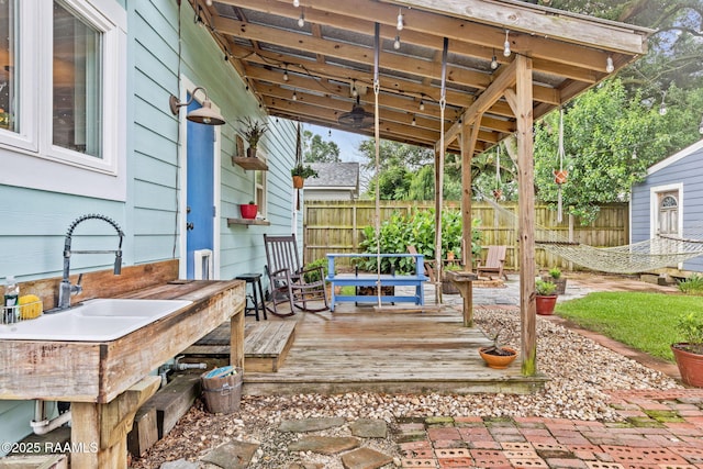 234 Ridgewood St, Lafayette, LA 70506 - view of patio with a wooden deck and a sink