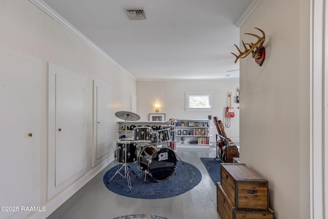 234 Ridgewood St, Lafayette, LA 70506 - sitting room featuring wood finished floors and crown molding