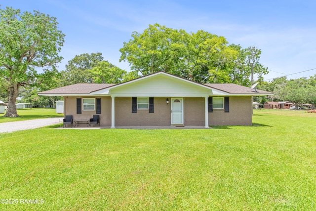 1329-B Grand Anse Hwy, Breaux Bridge, LA 70517 - single story home with a front yard and brick siding