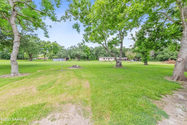 1329-B Grand Anse Hwy, Breaux Bridge, LA 70517 - view of grassy yard featuring view of scattered trees