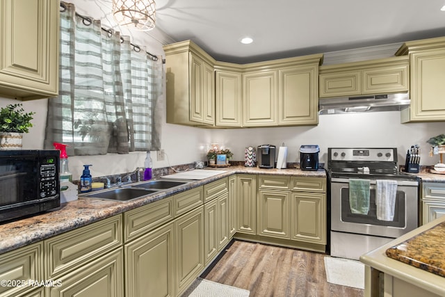 1329-B Grand Anse Hwy, Breaux Bridge, LA 70517 - kitchen with cream cabinets, under cabinet range hood, electric stove, black microwave, and light wood-style floors