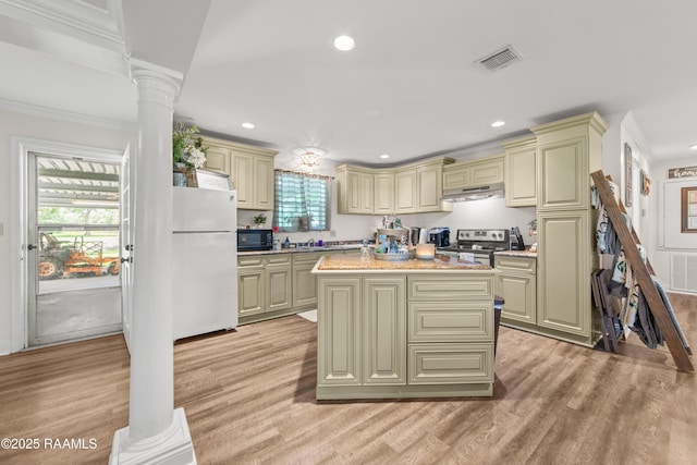 1329-B Grand Anse Hwy, Breaux Bridge, LA 70517 - kitchen featuring freestanding refrigerator, under cabinet range hood, black microwave, green cabinetry, and stainless steel range