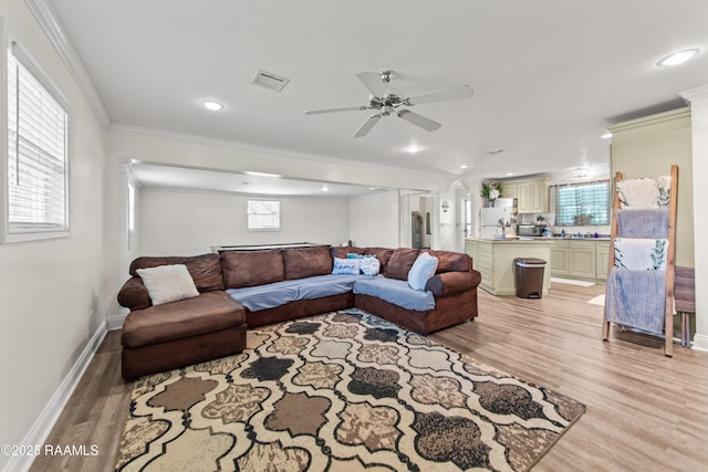 1329-B Grand Anse Hwy, Breaux Bridge, LA 70517 - living room with a ceiling fan, light wood-style flooring, ornamental molding, and recessed lighting
