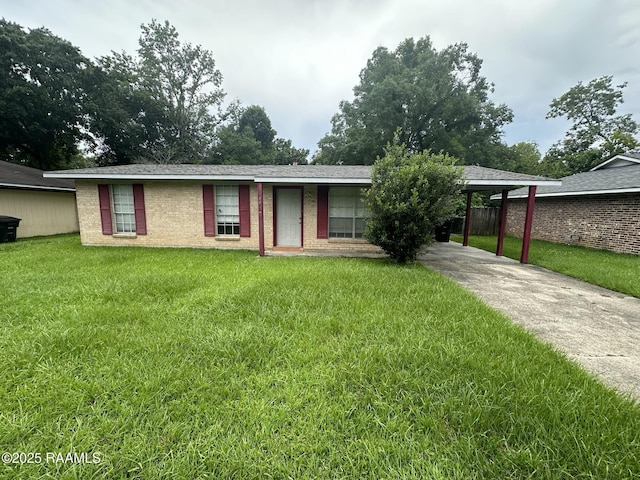 7226 Meadowview Ave, Baton Rouge, LA 70810 - ranch-style home with a front yard, concrete driveway, and brick siding