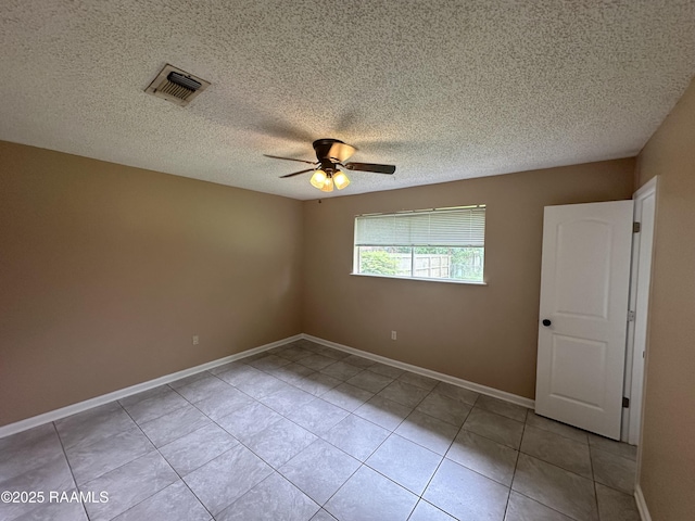 7226 Meadowview Ave, Baton Rouge, LA 70810 - tiled spare room featuring ceiling fan and a textured ceiling