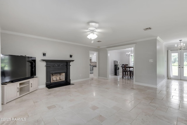 921 Bellevue Plantation Rd, Lafayette, LA 70503 - living area featuring a chandelier, a fireplace with raised hearth, ceiling fan, crown molding, and french doors
