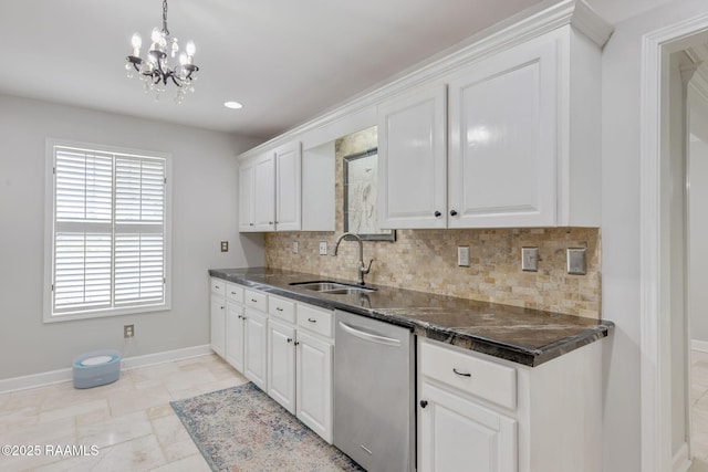 921 Bellevue Plantation Rd, Lafayette, LA 70503 - kitchen with stainless steel dishwasher, backsplash, white cabinets, a chandelier, and decorative light fixtures
