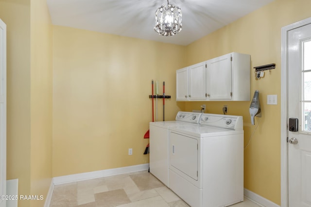 921 Bellevue Plantation Rd, Lafayette, LA 70503 - laundry area with cabinet space, separate washer and dryer, and a chandelier
