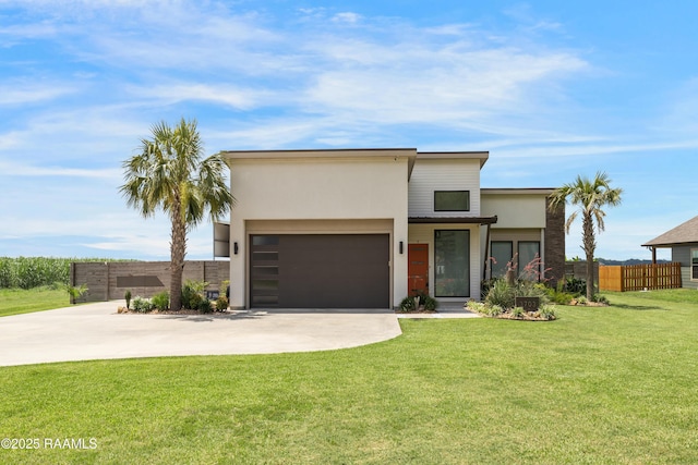 3703 Daspit Rd, New Iberia, LA 70563 - contemporary house with driveway, a garage, and stucco siding