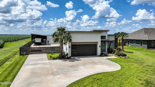 3703 Daspit Rd, New Iberia, LA 70563 - contemporary home with stucco siding, a front yard, driveway, and a carport