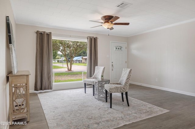 109 Guadalajara St, New Iberia, LA 70563 - living area featuring ornamental molding, a ceiling fan, and wood finished floors