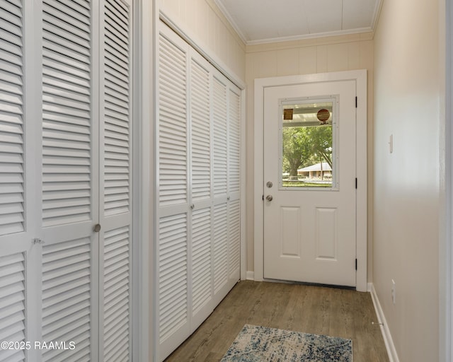 109 Guadalajara St, New Iberia, LA 70563 - doorway to outside featuring ornamental molding and wood finished floors