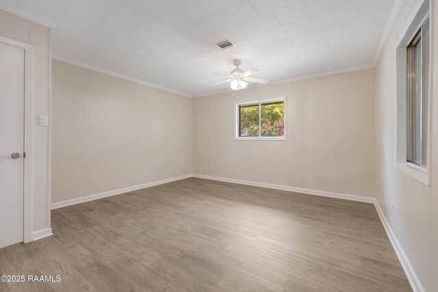 109 Guadalajara St, New Iberia, LA 70563 - spare room featuring ornamental molding, ceiling fan, and light wood-style flooring